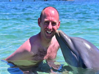Dolphin with tourists.